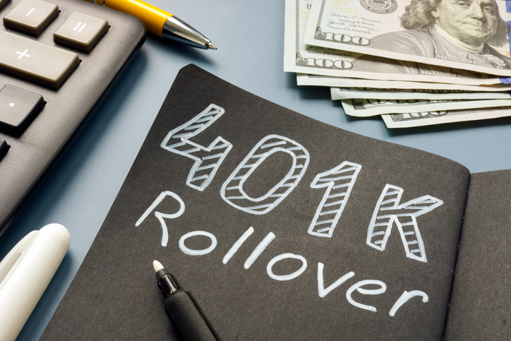 "401k rollover" written in a notebook.